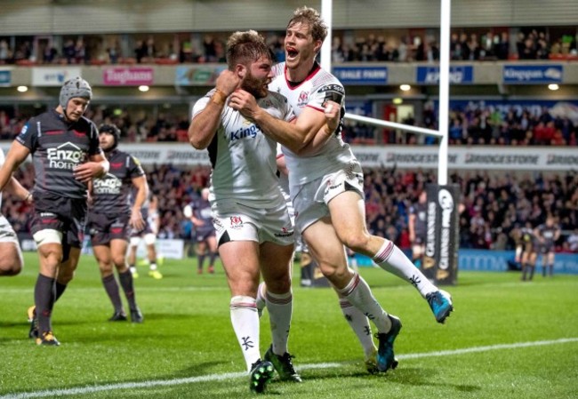 Andrew Trimble congratulates try scorer John Andrew