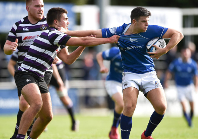 Patrick O'Driscoll is tackled by Ted Fitzgerald