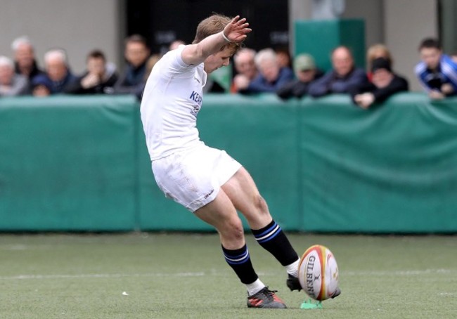 Tomas Quinlan kicks the winning penalty