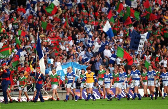 The teams parade before the match