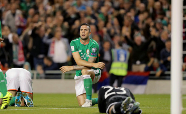 Shane Duffy and goalkeeper Darren Randolph dejected after Serbia score a goal