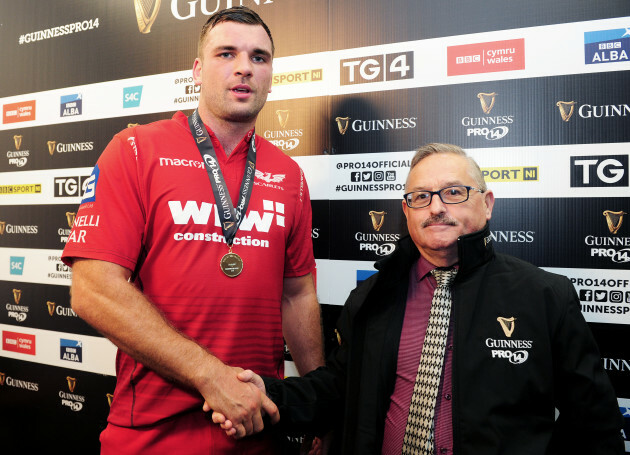 Tadhg Beirne is presented with the Guinness PRO14 man of the match award by Howard John