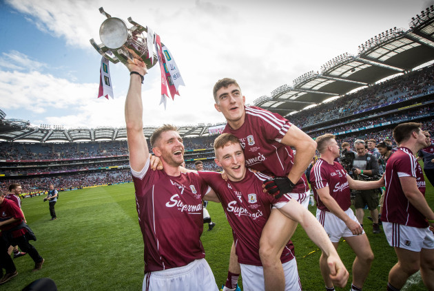Aidan Harte, Jack Grealish and Thomas Monaghan celebrate after the game