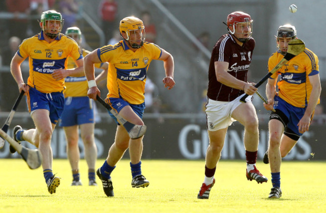 Joe Canning gets away from Diarmuid McMahon, John Conlon and Patrick Donnellan