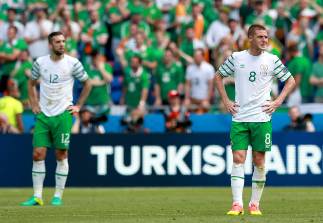 Shane Duffy and James McCarthy dejected after conceding his sides second goal