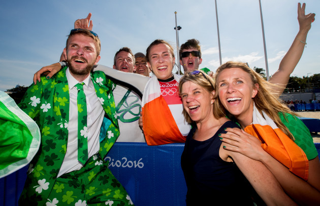 Annalise Murphy celebrates winning silver with brother Finn, mother Cathy McAleavey and sister Claudine
