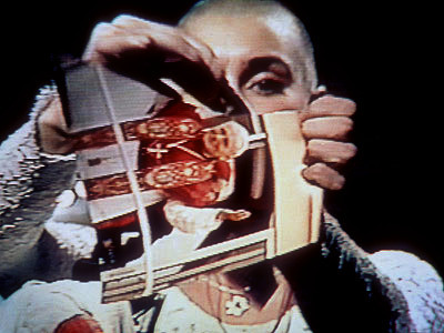 Image result for sinead o'connor tearing up picture of pope"