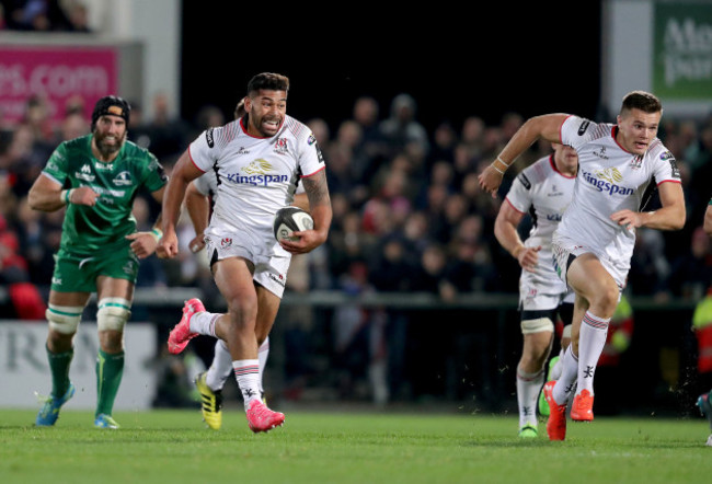 Charles Piutau makes a break supported by Jacob Stockdale