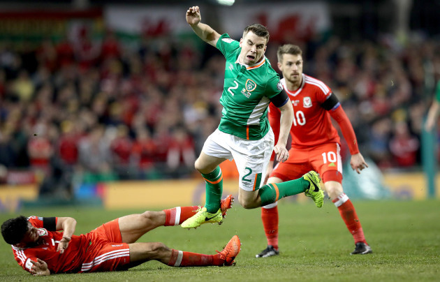 Seamus Coleman is tackled by Neil Taylor