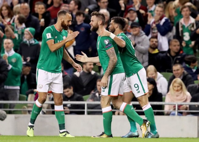 Daryl Murphy celebrates scoring a goal with Shane Long and David Meyler