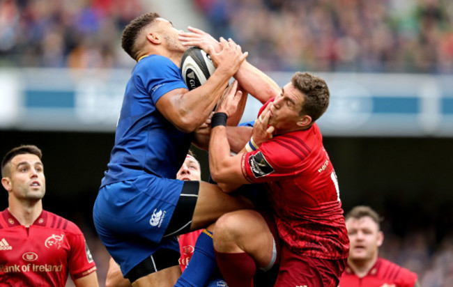 Adam Byrne competes for a high ball with Ian Keatley