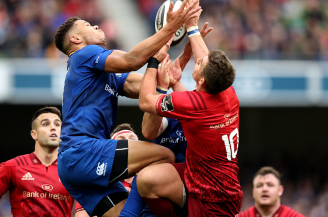 Adam Byrne competes for a high ball with Ian Keatley