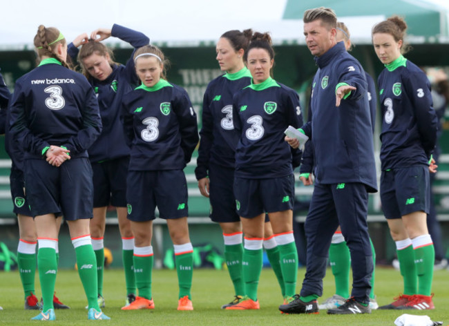 Colin Bell speaks to his team