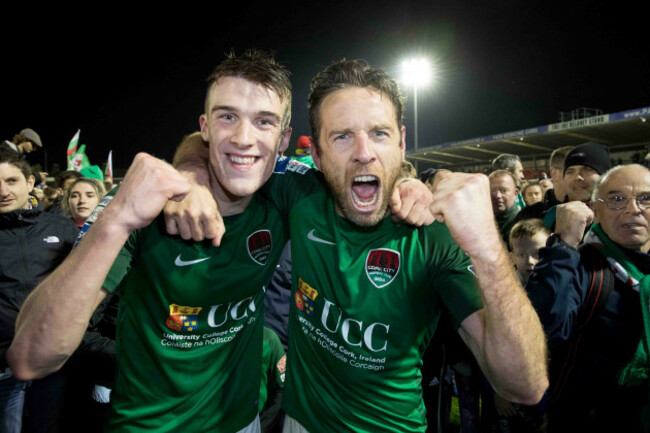 Ryan Delaney and Alan Bennett celebrate winning the league with supporters