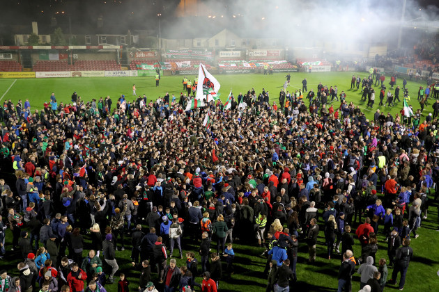 CorkÕs City fans invade the pitch at the end of the game