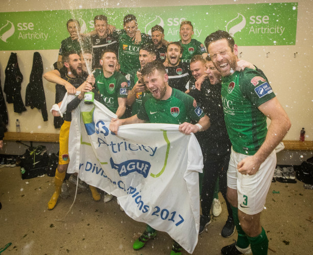 Cork celebrate in the dressing room after winning The SSE Airtricity League