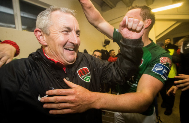John Caulfield celebrates in the dressing room after the game