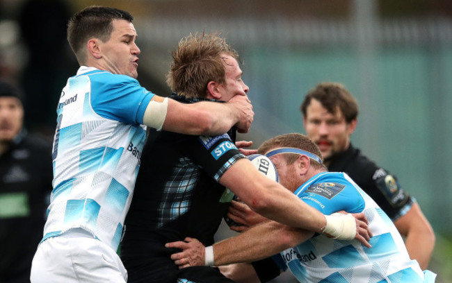 Jonny Gray tackled by Johnny Sexton and Sean Cronin