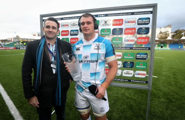 Rhys Ruddock is presented with his man of the match award by Mark Irwin