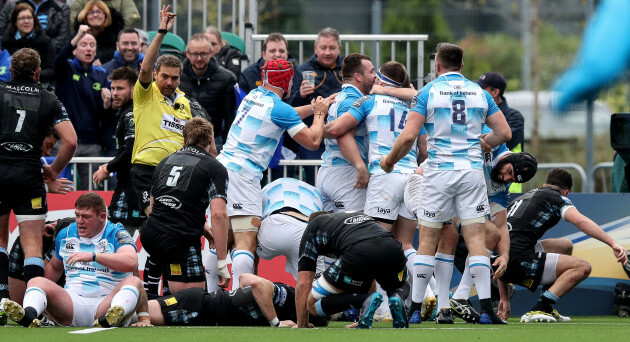 Cian Healy is congratulated by his teammates after scoring a try