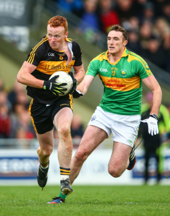 Johnny Buckley is tackled by Brendan O&Otilde;Sullivan