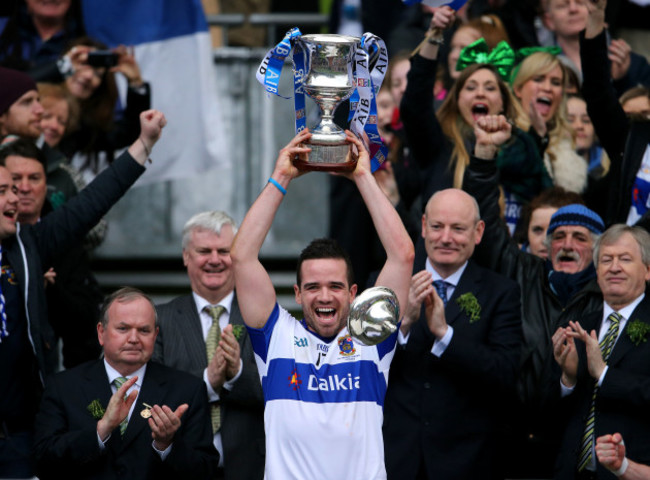 Ger Brennan lifts the cup