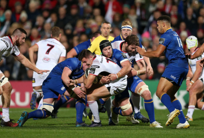 Jacob Stockdale is tackled by Sean O&Otilde;Brien and Dan Leavy