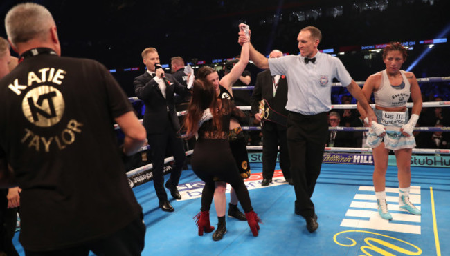 Katie Taylor is declared the winner as she is congratulated by her mother Bridget Taylor