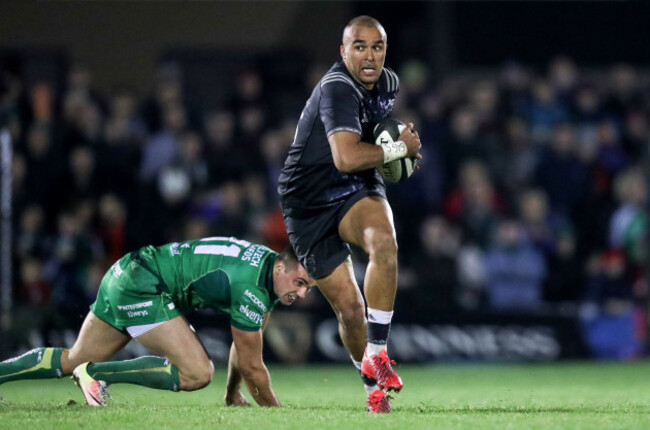 Simon Zebo gets past Cian Kelleher