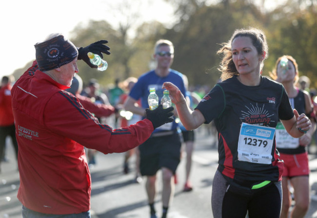 A steward passes out water in The Phoenix Park