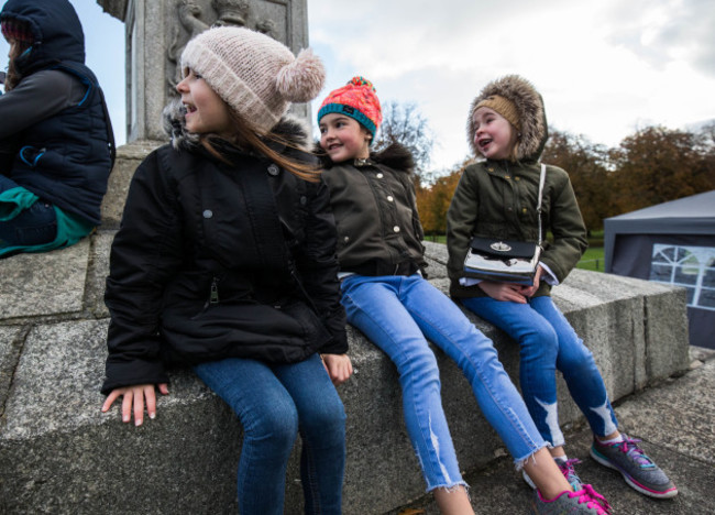 Holly Kinnear, Layla Cooney and Georgia Kinnear watch the marathon pass by