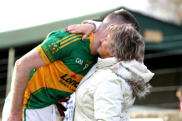 Seamus Kennedy is consoled by his grandmother Mary Wall after the game