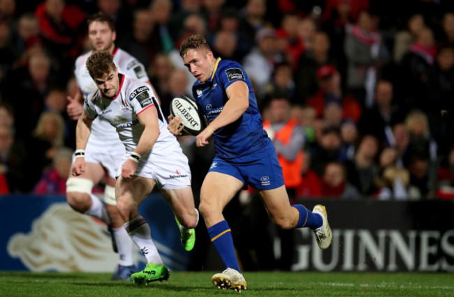 Leinster’s Jordan Larmour runs in to score a try from Ulster’s Aaron Cairns