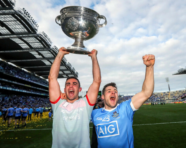 James McCarthy and Kevin McManamon celebrate with The Sam Maguire