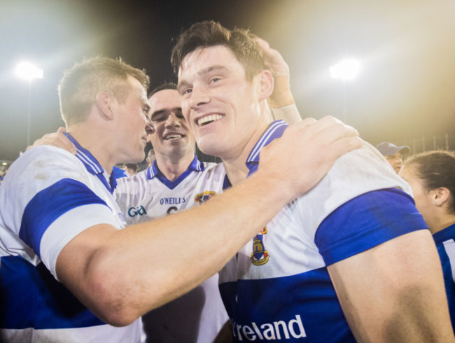 Diarmuid Connolly celebrates with Ger Brennan and Tomas Quinn