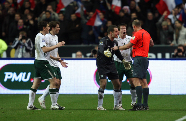 Shay Given and Sean St. Ledger appeal to referee Martin Hansson