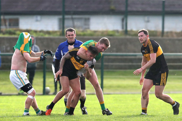 Tempers flair between Clonmel’s Liam Ryan and Micheal Burns of Dr Crokes