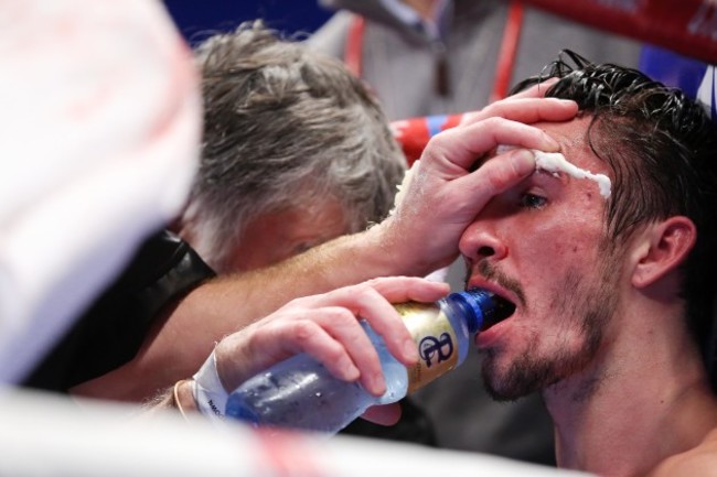 Jamie Conlan is treated between rounds