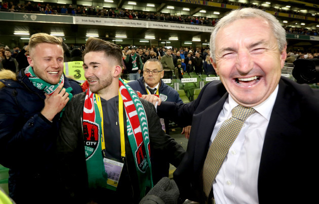 John Caulfield celebrates with former players Kevin O'Connor and Sean Maguire