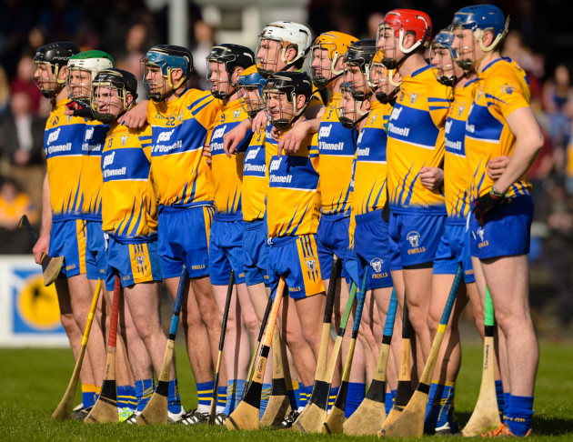 The Clare team stand for the national anthem