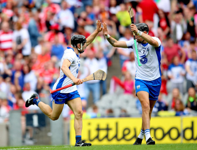 Jamie Barron celebrates scoring his sides fourth goal with Maurice Shanahan