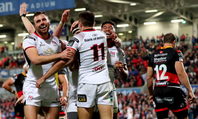 Tommy Bowe and Charles Piutau celebrate with try scorer Jacob Stockdale