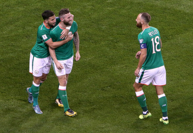 Daryl Murphy celebrates his first goal with Shane Long and David Meyler