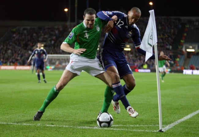 John O'Shea with Thierry Henry