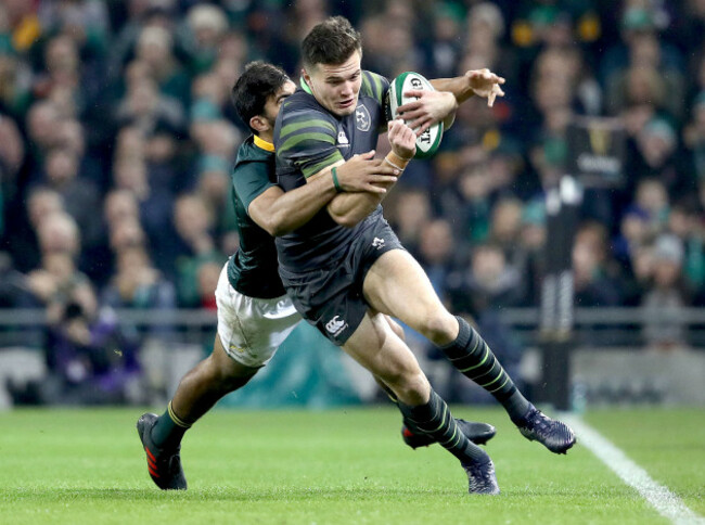 Jacob Stockdale tackled by Damian de Allende