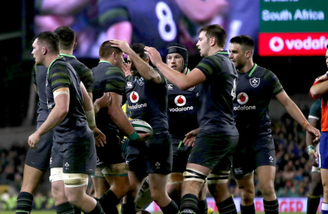 Ireland players congratulate CJ Stander after winning a turn over