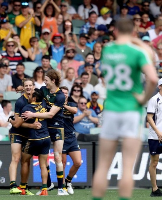 Nat Fyfe celebrates scoring a goal with teammates