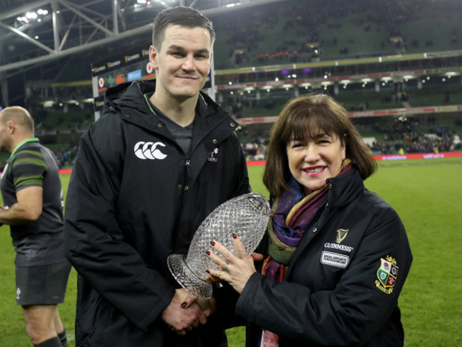 Johnny Sexton is presented with the man of the match award by Syl Saller