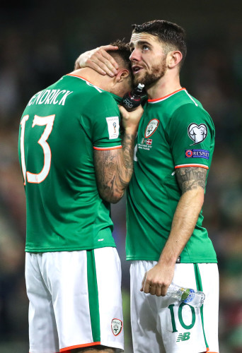 Jeff Hendrick and Robbie Brady dejected after the match