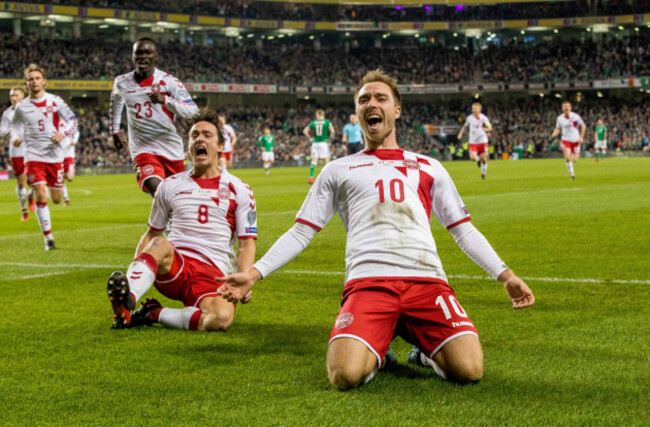 Christian Eriksen celebrates scoring their third goal with Thomas Delaney